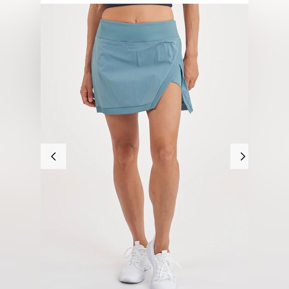 SOLD as set on posh, can’t delete.  Thrive Societe Asymmetrical Blue Skirt